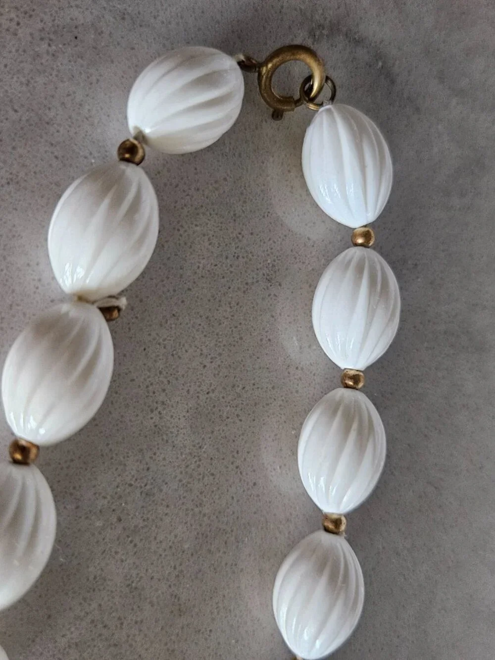 RARE AND VINTAGE WHITE RIBBED OVAL BEAD 48